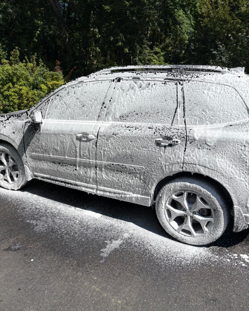 foamed vehicle ready to be rinsed